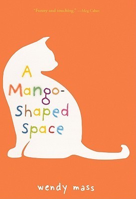 A book cover. It is orange, with the outline of a cat in the left half. The space inside the cat is white. The title "A Mango-Shaped Space" is in this space, with each letter a different colour. At the bottom of the book, in small white writing, the authors name "Wendy Mass" in lowercase. /end