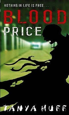A book cover. The background appears to be a blurred photograph of a green tinted underpass. In the foreground of the, the black silhouette of a skinny ghoulish creature in long, tattered robes. 
Text at the top of the image reads"
"Nothing in life is free..." in small, white capitals,
The title "Blood Price", with "Blood" in large, red capitals, and "Price" in slightly smaller white capitals immediately below it. 
Text at the bottom of the image reads:
The author's name "Tanya Huff" in slightly smaller, white capitals. /end