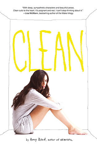 A book cover. A photograph of a woman sitting on the floor occupies the lower half of the cover. Her knees are pulled up to her chest and she is looking slightly off to the side. She is in a plain white box room that looks like it has been drawn in pencil.
At the top of the cover, a review reads:
""With deep, sympathetic characters and beautiful prose, 'Clean' cuts to the heart. It's poignant and real. I can't stop thinking about it." -Lisa McMann, bestselling author of the Wake trilogy" in very small black writing.
The title of the book "Clean" is in large, yellow capitals across the upper centre of the cover, directly above the photograph of the woman.
Directly below the woman, the author's name "by Amy Reed, author of Beautiful" in small black writing. /end