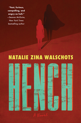 A book cover. The title "Hench" is written in large blue capitals with a red outline at the bottom of the cover. Below it, "A Novel" in small, faint red cursive. Above the title, the author's name "Natalie Zina Walschots" in smaller yellow capitals. In the upper left corner, a quote by New York Times bestselling author Seanan McGuire, that reads "Fast, furious, compelling, and angry as hell." in smaller white writing. The background is dark red and shows the shadow of a young woman standing in the centre, above the title. Behind her, cast on an even dark red background, her shadow, made to look like it is wearing a cape. /end