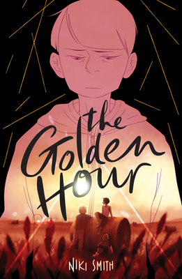 A book cover. The title "The Golden Hour" is written across the centre in split cursive-print black writing. The author's name "Niki Smith" is written at the bottom of the cover in small yellow caps. The background shows the outlined figure of a young boy against a black space. He looks sad. Over his figure, art of three young children playing in a wheat field at sunset. /end