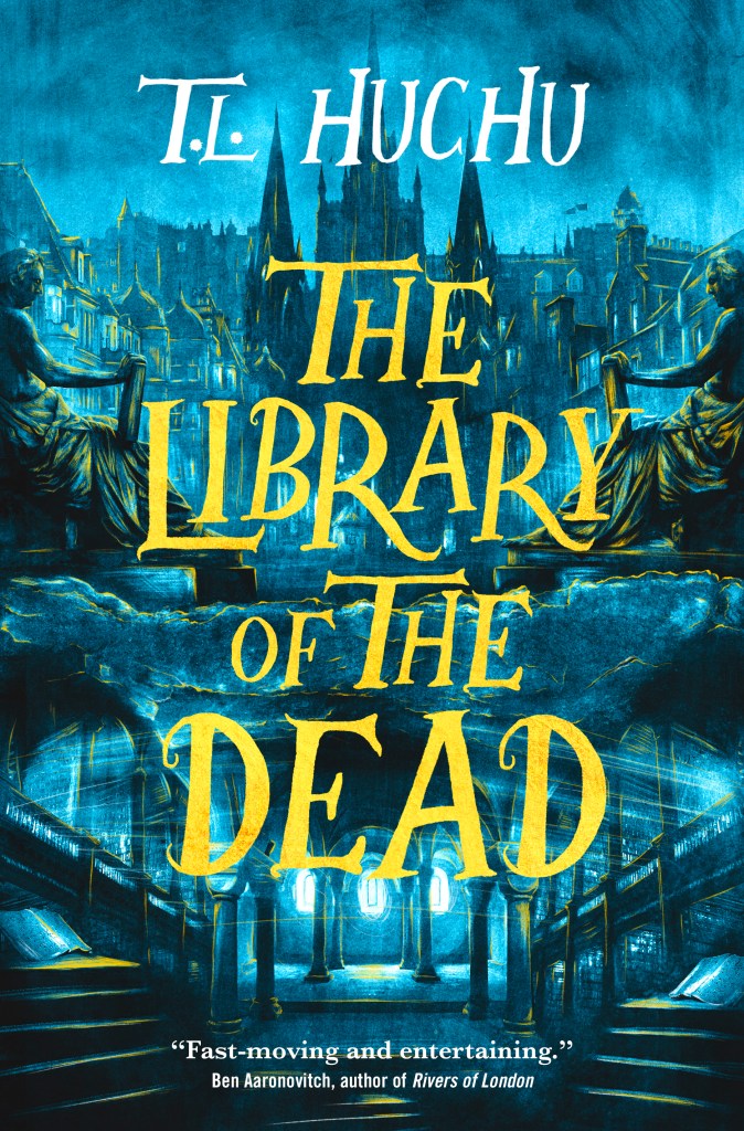 A book cover. The author's name "T. L. Huchu" is written at the top in large white caps. The title "The Library of the Dead" is written down the centre in larger yellow caps. A quote at the bottom from Ben Aaronovitch, author of 'Rivers of London', reads "Fast moving and entertaining" in small white writing. The cover shows a dark city scape with a blue hue. A tall building with spires is in the centre. Two staircase can be seen on either side if the cover at the bottom. At the top of each stair case, a statue of a person in a robe sitting down. /end