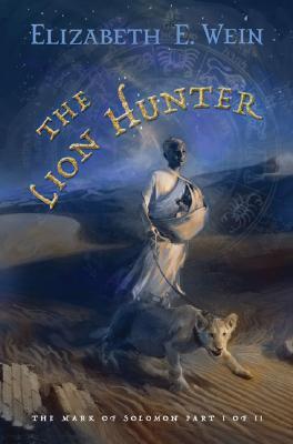 A book cover. The author's name "Elizabeth E. Wein" is written at the top in blue caps. The title "The Lion Hunter" is written in slightly larger yellow caps below this, on the left side of the cover. At the bottom of the cover, in small white caps, text reads "The mark of Solomon part I of II". The background shows a painting of a man walking a juvenile lion through sand dunes at night. /end