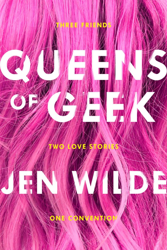 A book cover. Small yellow text at the top reads "Three Friends" in yellow capitals. The title "Queens of Geek" is written below this in large white capitals. Below this, yellow text reading "Two Love Stories" in small capitals. Below this, the author's name "Jen Wilde" in large white capitals. Below this, small yellow text reading "One Convention" in capitals. The background appears to be a close shot of a section of long pink hair. /end
